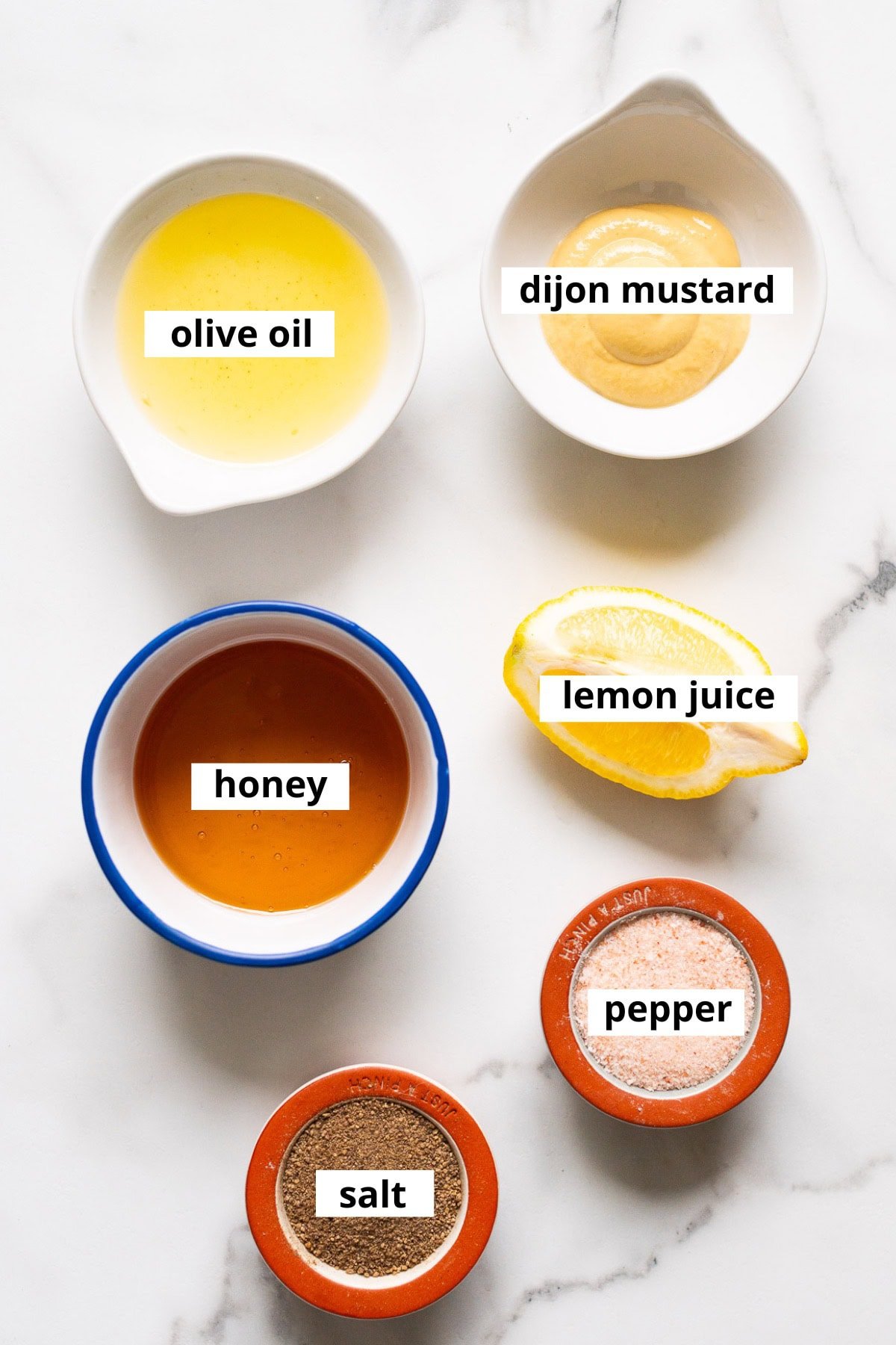DIjon mustard, lemon juice, honey, olive oil, salt and pepper.