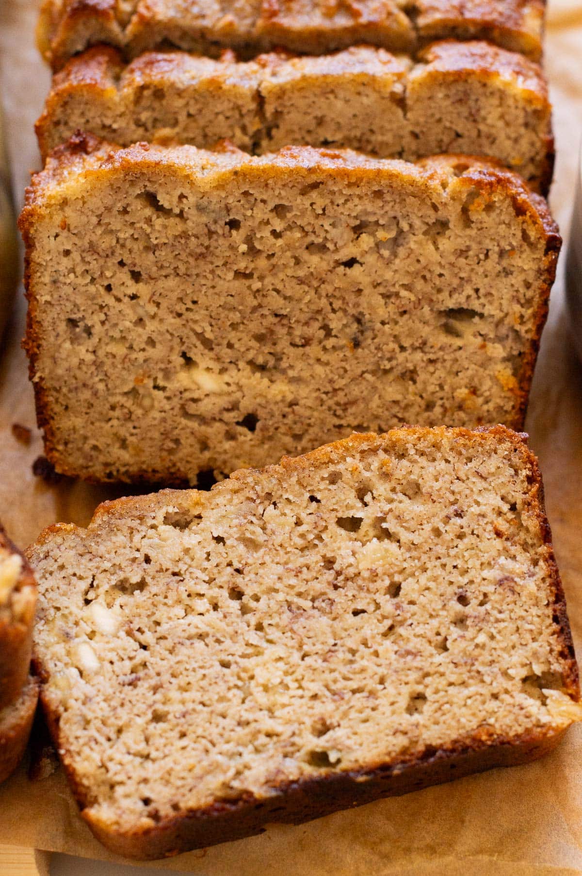 A close up of a slice of banana bread.