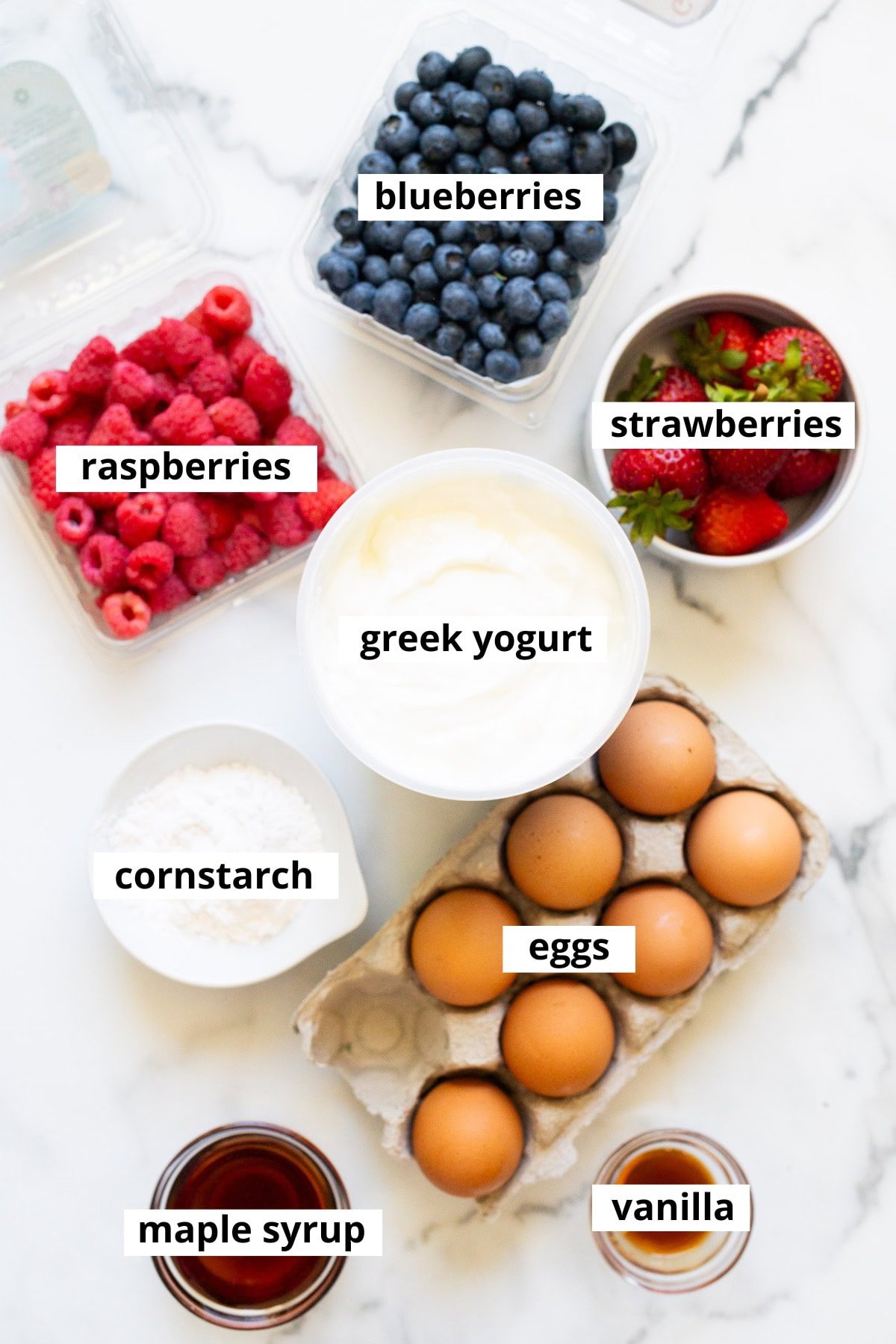 Greek yogurt, raspberries, blueberries, strawberries, eggs, cornstarch, maple syrup and vanilla.