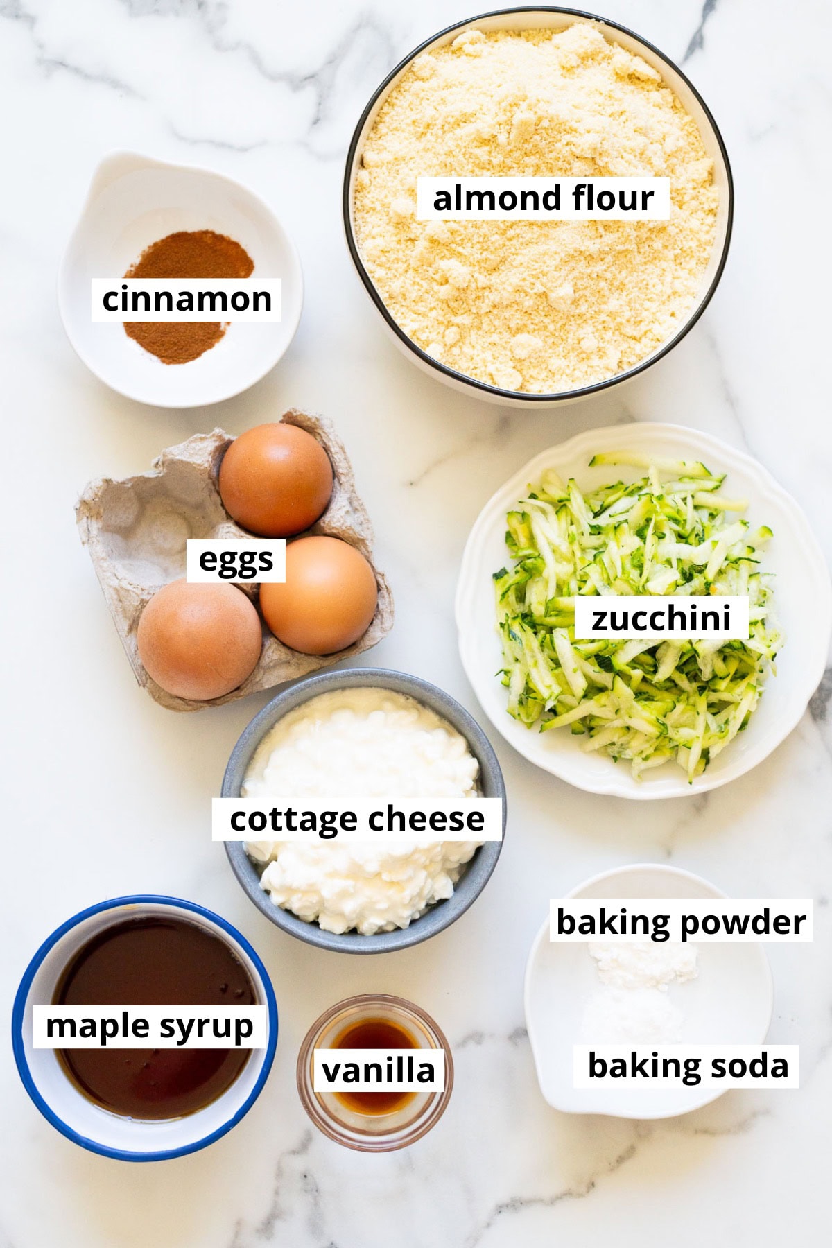 Zucchini, almond flour, eggs, cinnamon, cottage cheese, baking powder, baking soda, vanilla, maple syrup.