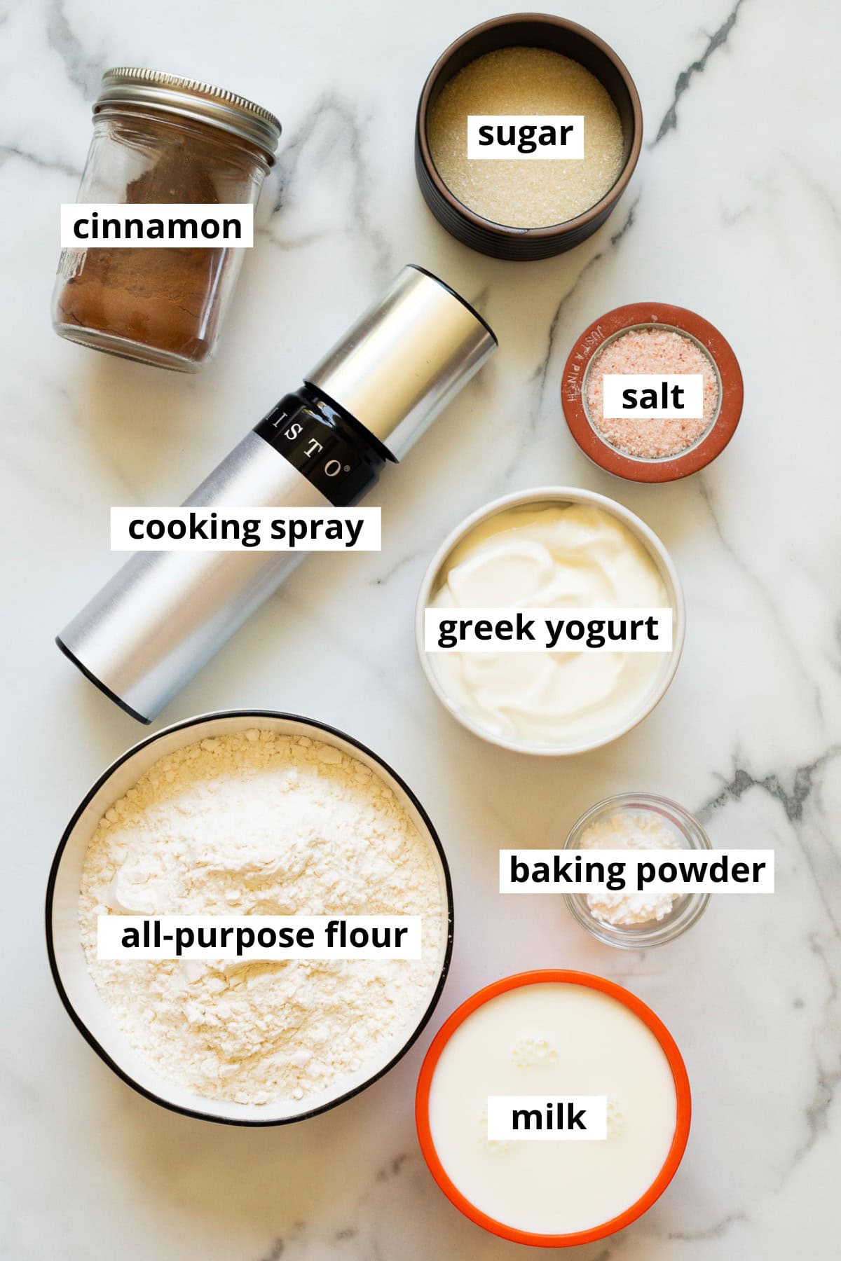 Greek yogurt, milk, all-purpose flour, baking powder, cooking spray, cinnamon, sugar, salt.