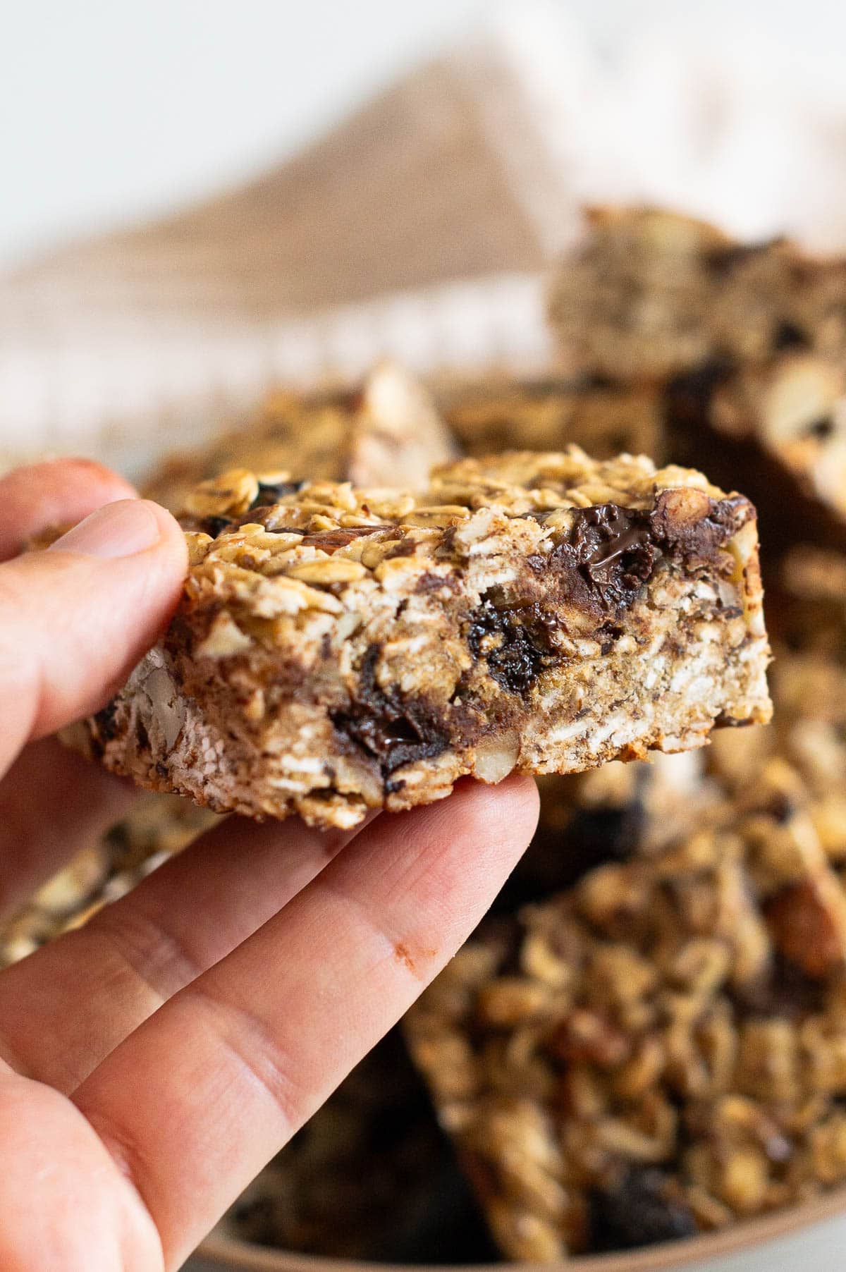 Person holding homemade bar showing texture inside.