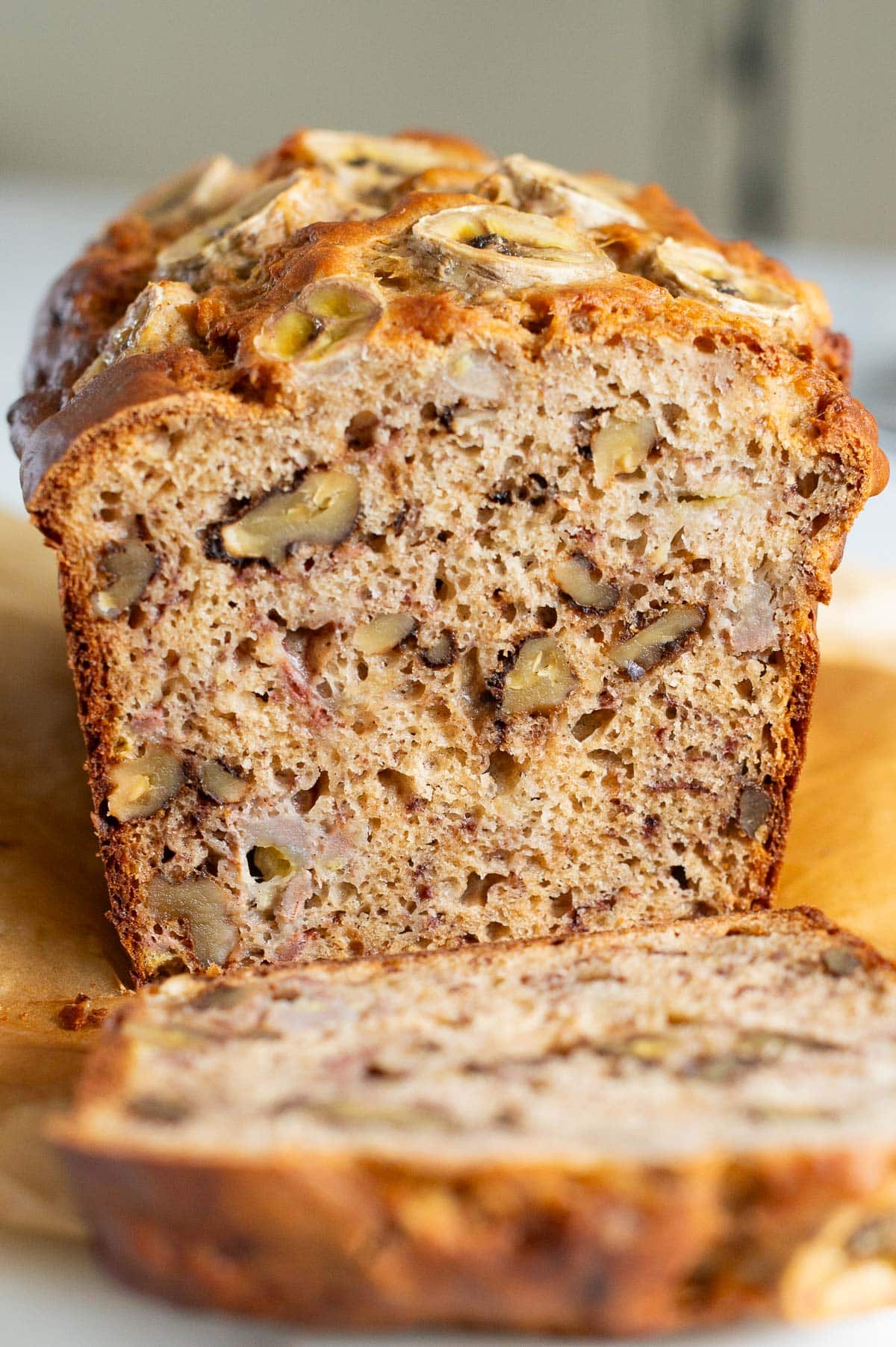 Sliced banana bread showing texture inside.