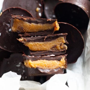 Healthy peanut butter cups showing filling inside.