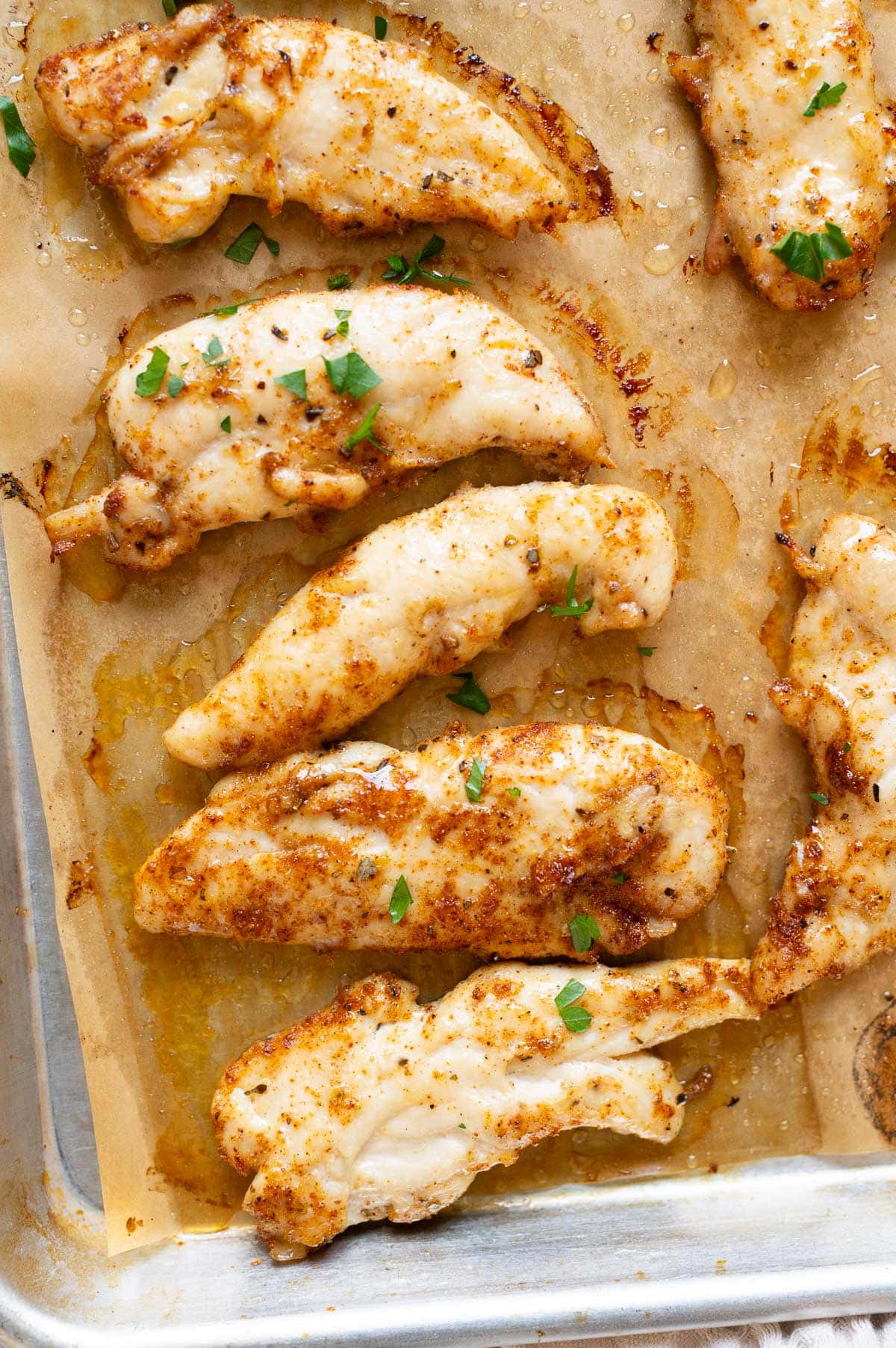 Close up of baked chicken tenders.