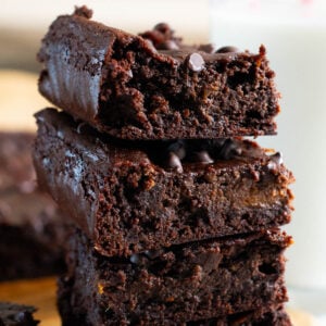 4 sweet potato brownies stacked on top of each other.