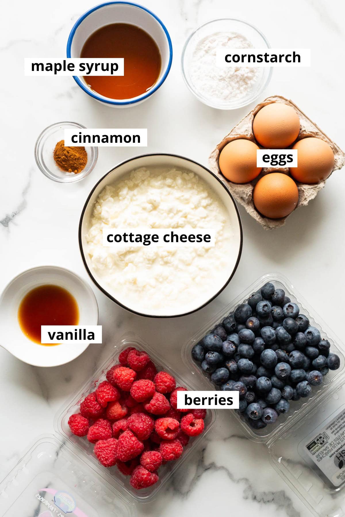 Cottage cheese, raspberries, blueberries, cinnamon, eggs, cornstarch, maple syrup and vanilla.