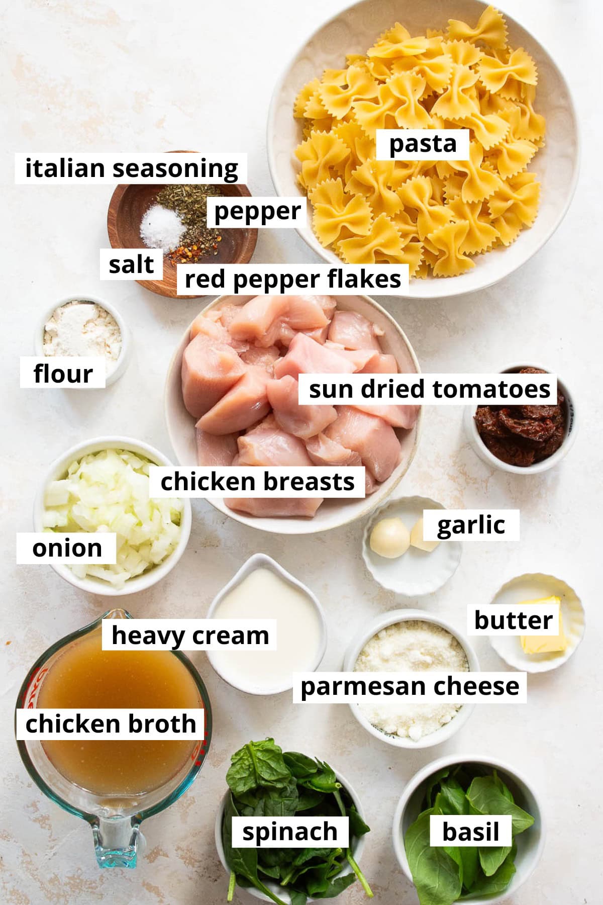 Chicken breasts, flour, butter, chicken broth, heavy cream, sun dried tomatoes, red pepper flakes, garlic, parmesan cheese, italian seasoning, basil, olive oil, onion, spinach, salt and pepper.