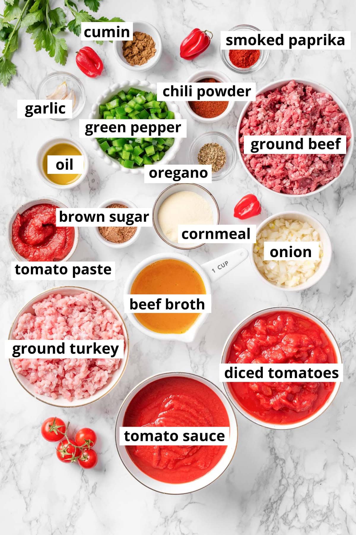 Ground beef, ground turkey, smoked paprika, chili powder, cumin, garlic, onion, green pepper, oregano, oil, brown sugar, cornmeal, beef broth, tomato paste, diced tomatoes, tomato sauce.