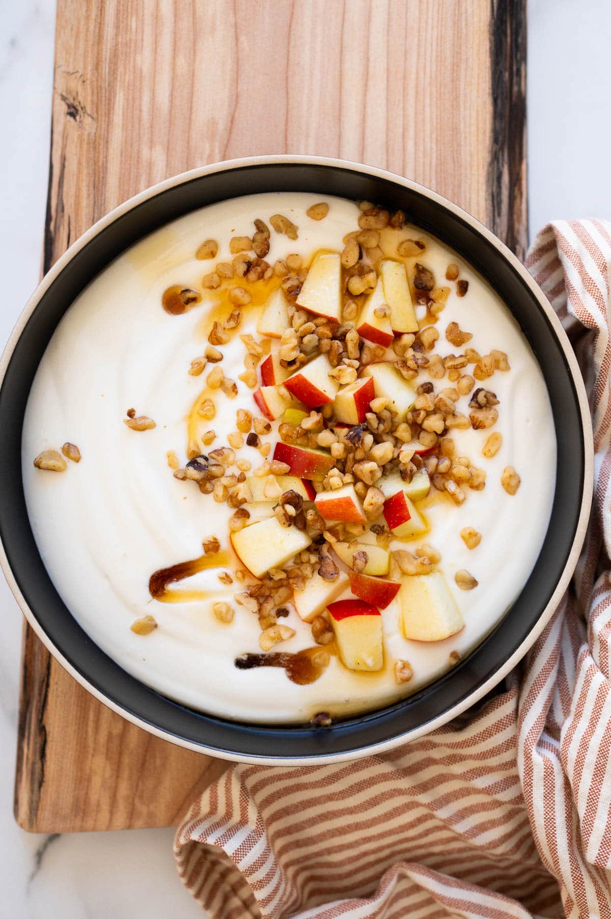 Whipped cottage cheese with apples, walnuts and maple syrup.
