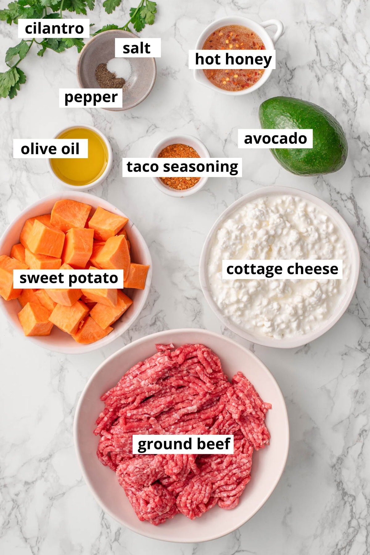 Sweet potato, cottage cheese, hot honey, avocado, cilantro, olive oil, salt, pepper, ground beef, taco seasoning.