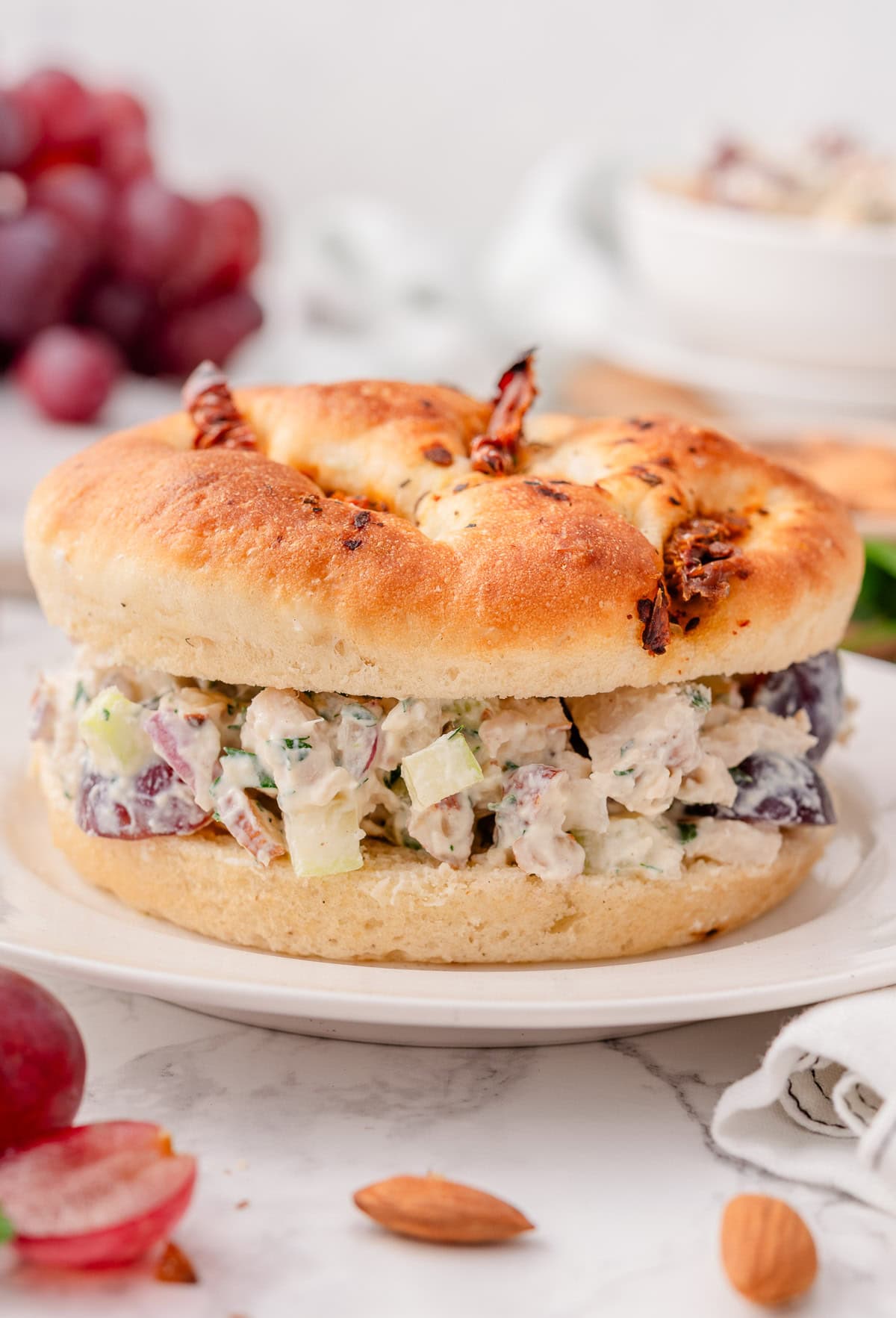 Greek yogurt chicken salad on a sun-dried tomatoes bun.