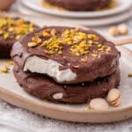 2 Greek yogurt ice cream bars on a plate.