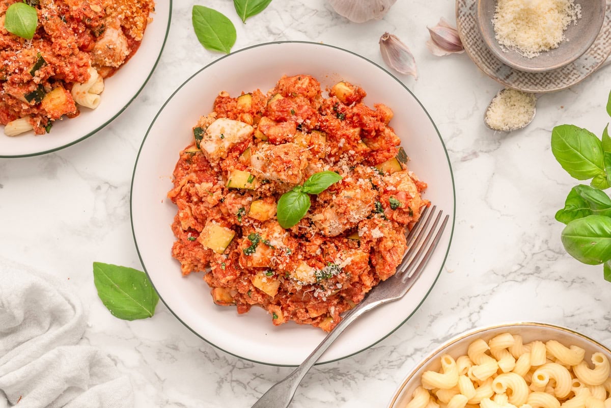 Looking down on a bowl with chicken parmesan zucchini skillet.