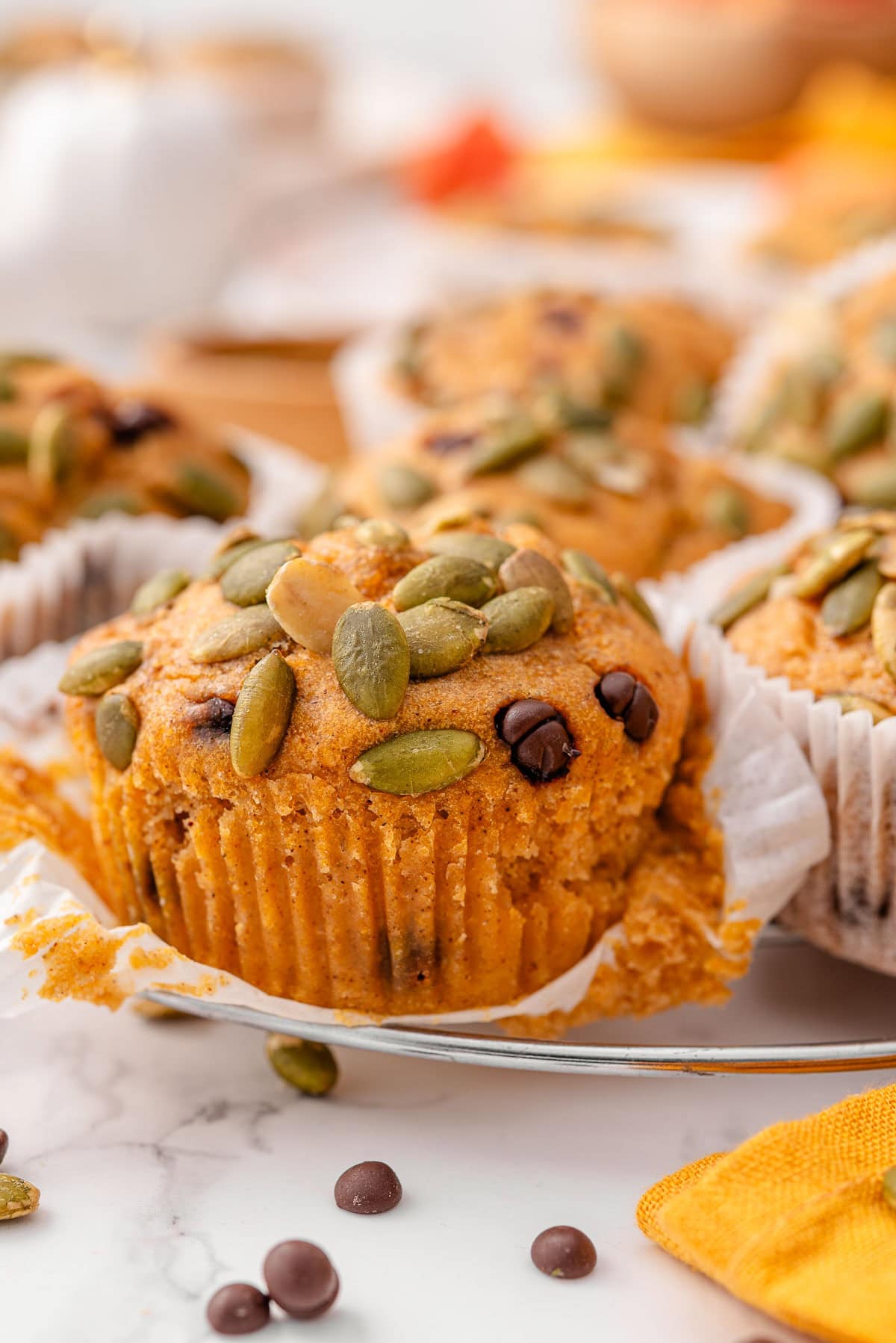 Cottage cheese pumpkin muffins on a wire rack.