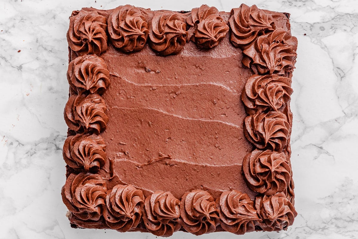 Chocolate zucchini cake with healthy chocolate frosting.