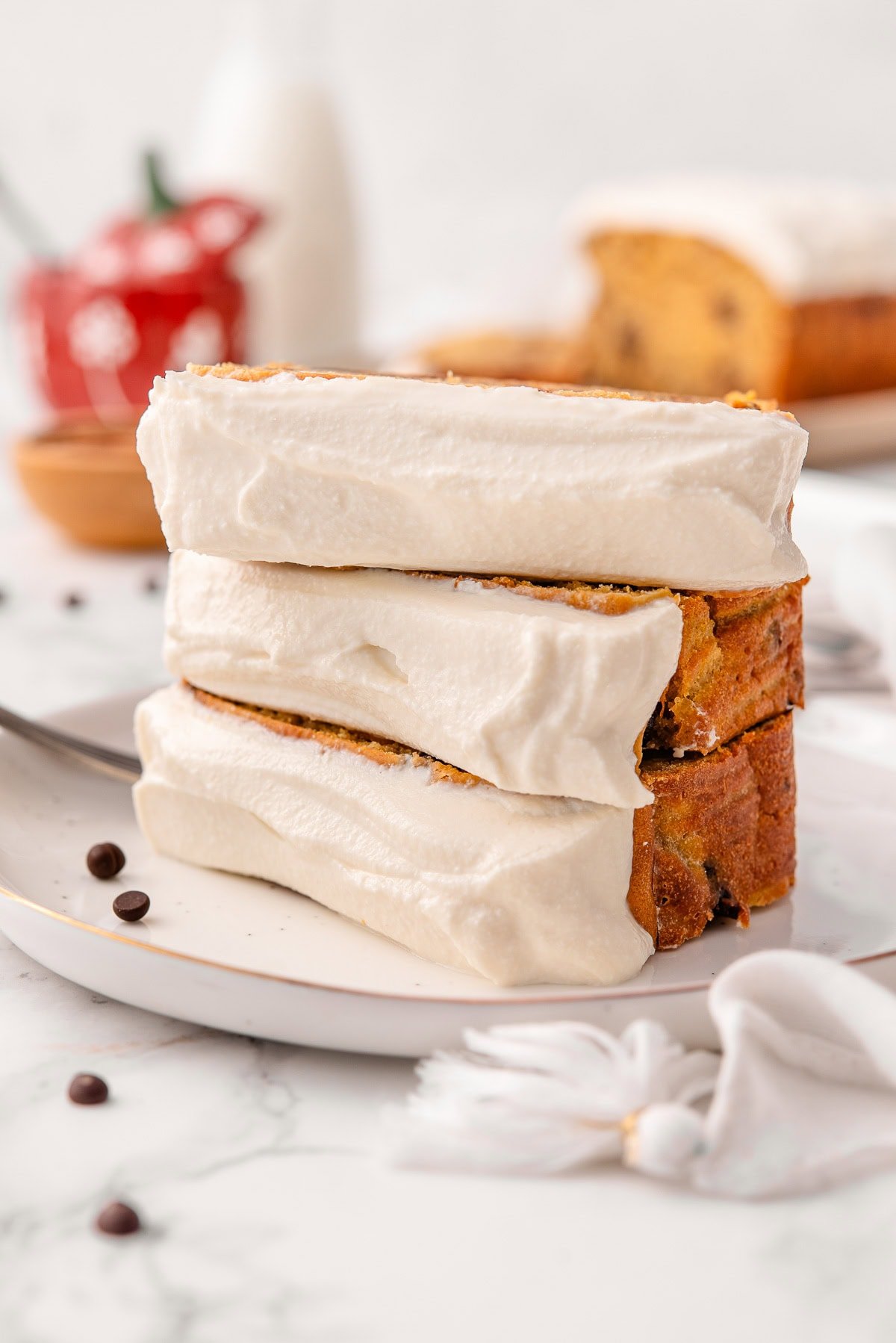 Three slices of cottage cheese pumpkin bread.
