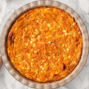 Crustless cottage cheese sweet potato quiche in a pie dish.