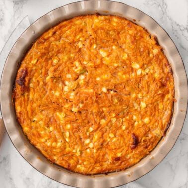 Crustless cottage cheese sweet potato quiche in a pie dish.
