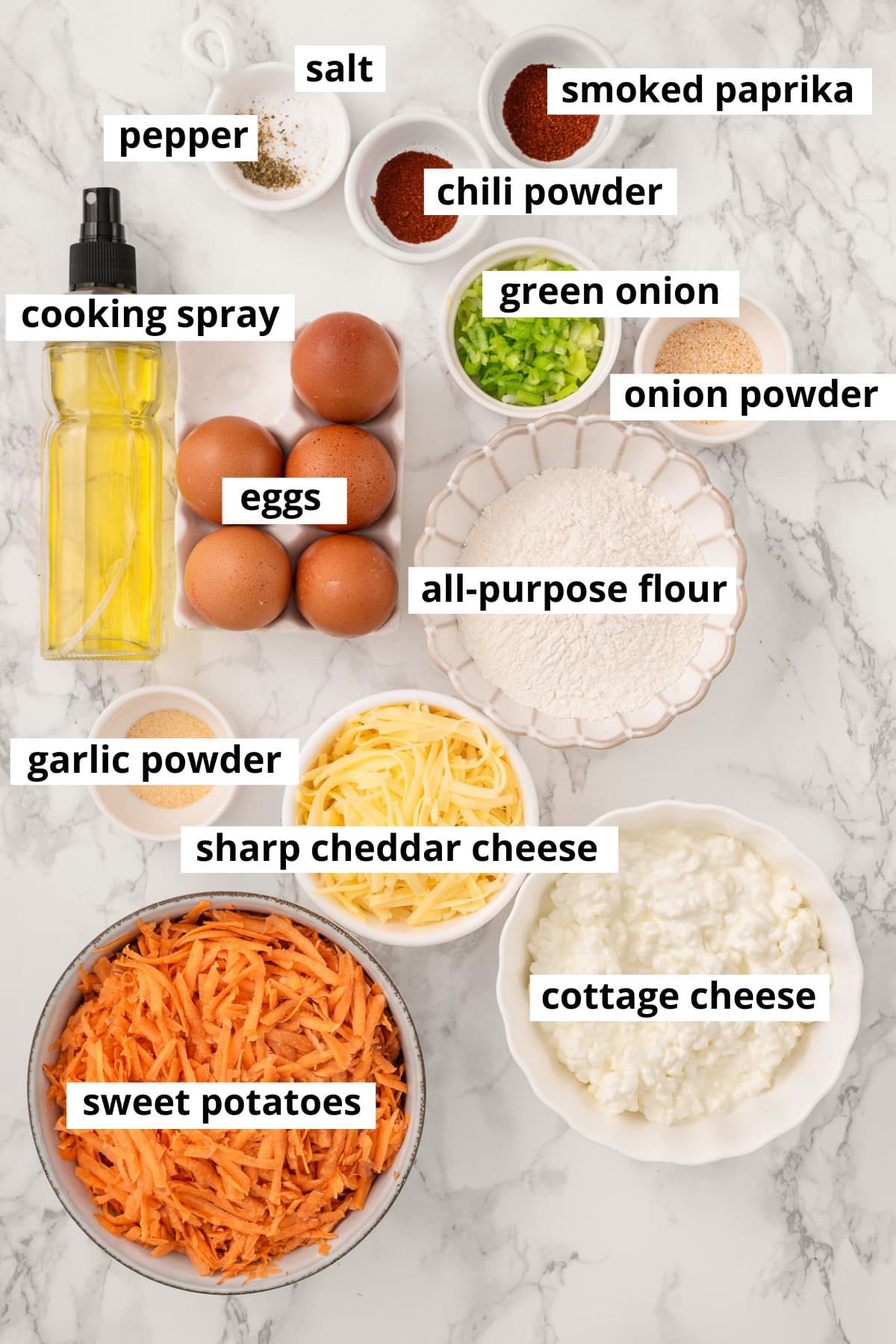 Sweet potatoes, eggs, cottage cheese, onion powder, cheese, garlic powder, flour, green onion, cooking spray, chili powder, smoked paprika, salt and pepper.