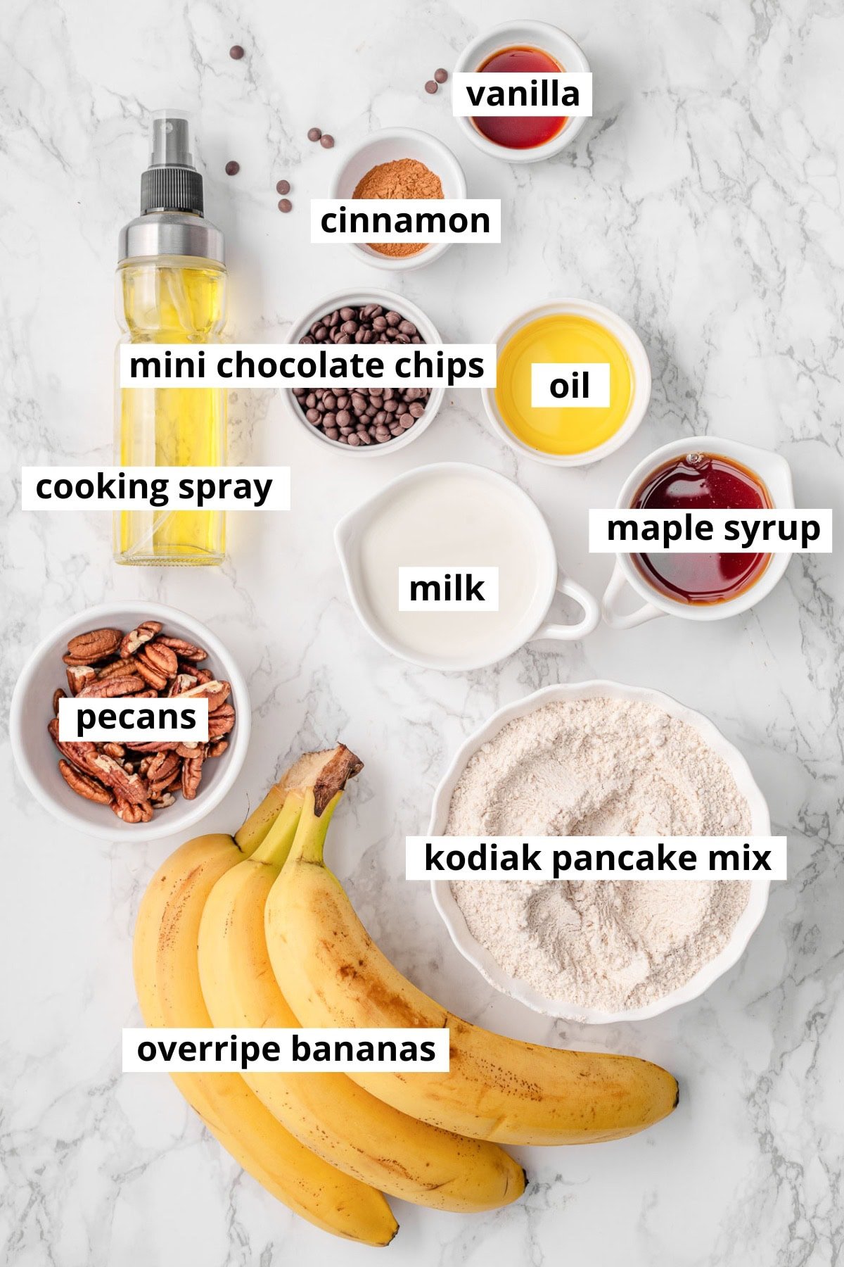Kodiak pancake mix, overripe bananas, pecans, maple syrup, milk, vanilla, cinnamon, cooking spray, oil, chocolate chips.