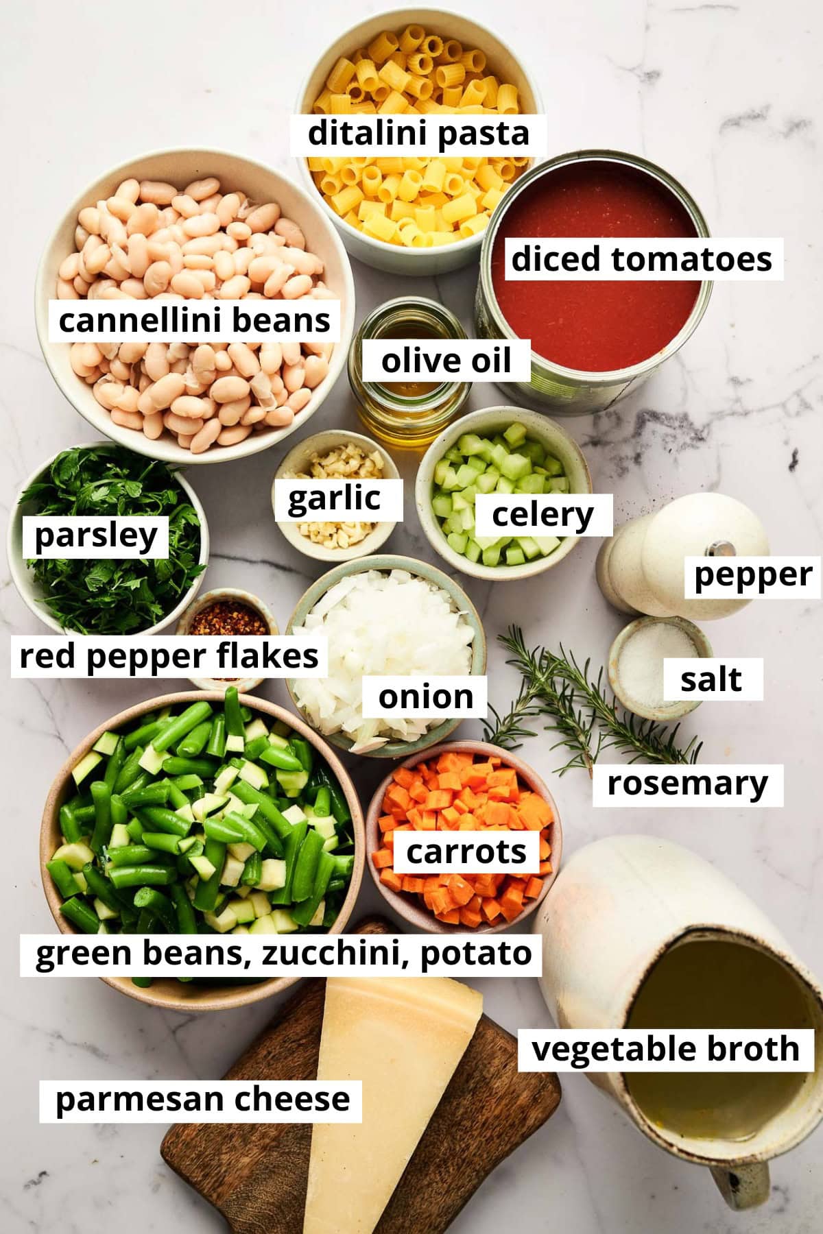 Diced tomatoes, cannellini beans, ditalini pasta, olive oil, garlic, celery, onion, carrots, parsley, salt, pepper, red pepper flakes, rosemary, greens beans, zucchini, potato, parmesan cheese, vegetable broth.