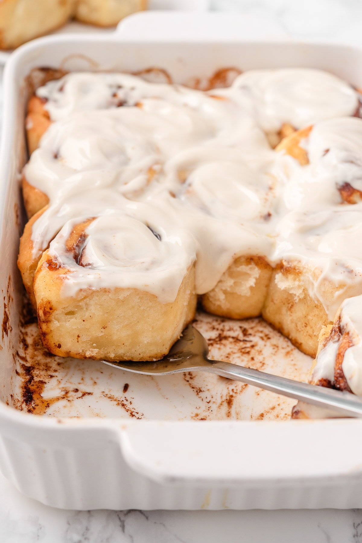 Cottage cheese cinnamon rolls in a baking dish.