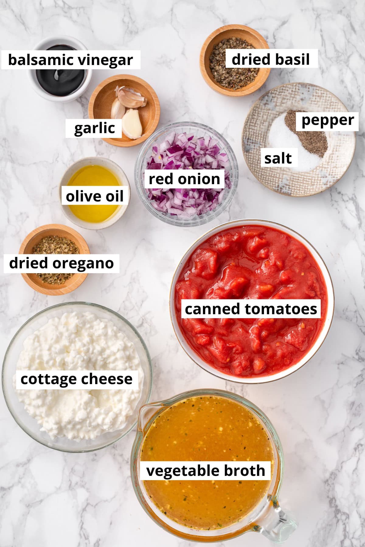 Diced tomatoes, vegetable broth, cottage cheese, olive oil, red onion, balsamic vinegar, dried oregano, dried basil, garlic, salt, pepper.