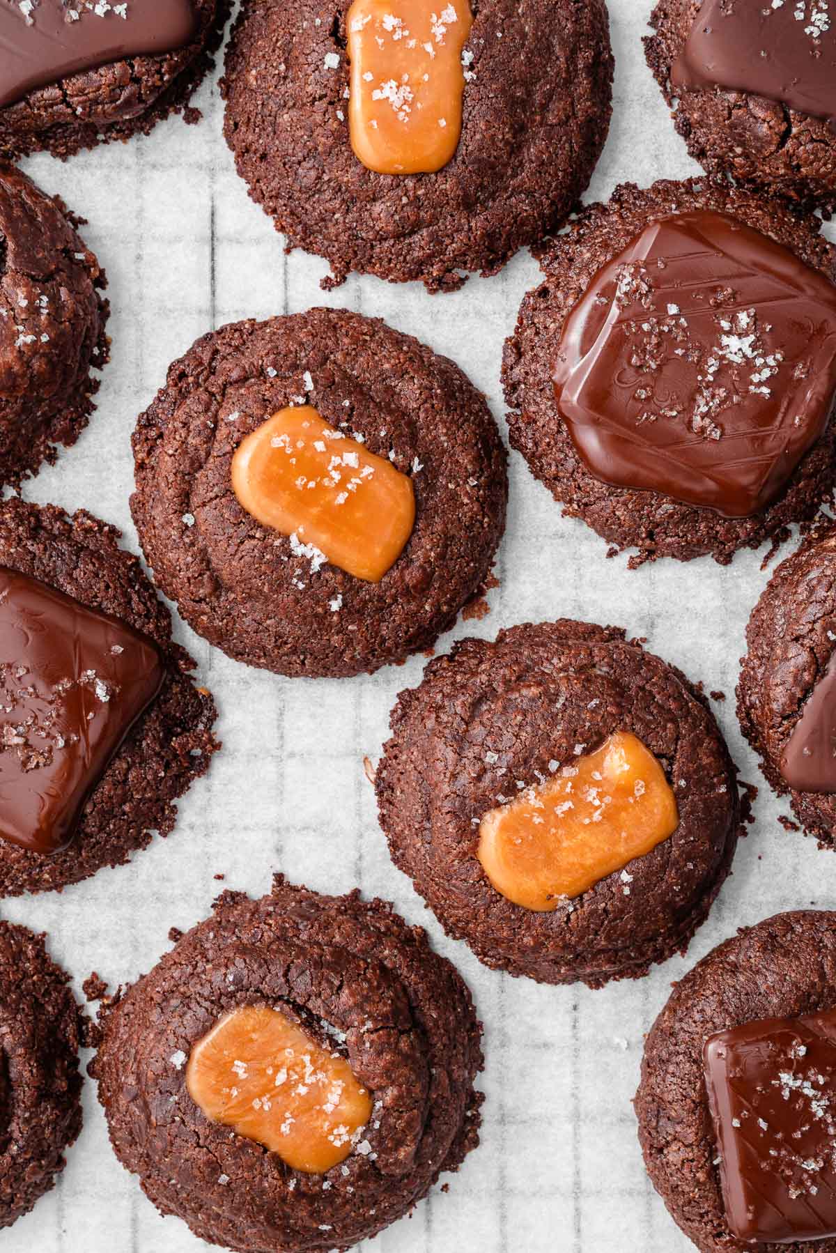 Looking down on 3 ingredient nutella cookies topped with caramel, chocolate and sea salt.