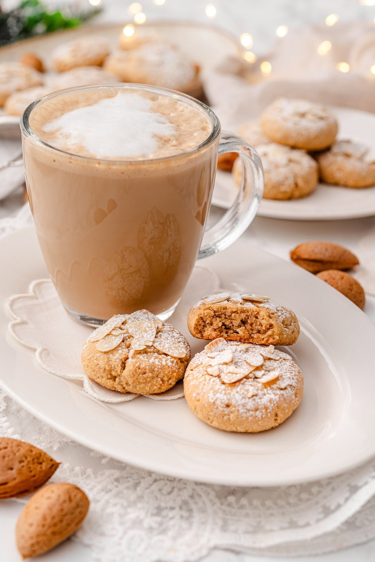 Three almond cookies served with caffe latte.