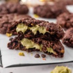 Dubai chocolate oatmeal cookies stack showing texture and cream inside.