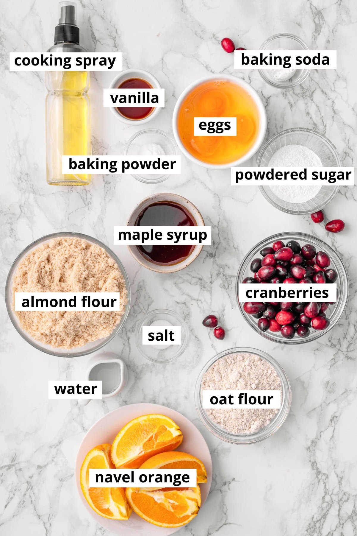 Almond flour, oat flour, orange, cranberries, baking soda, baking powder, salt, vanilla, water, powdered sugar, cooking spray, maple syrup, eggs.