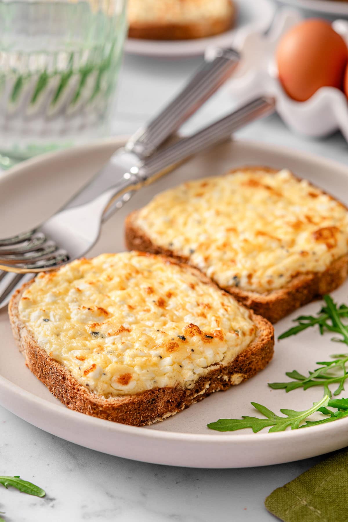 Cottage cheese toast on a plate.