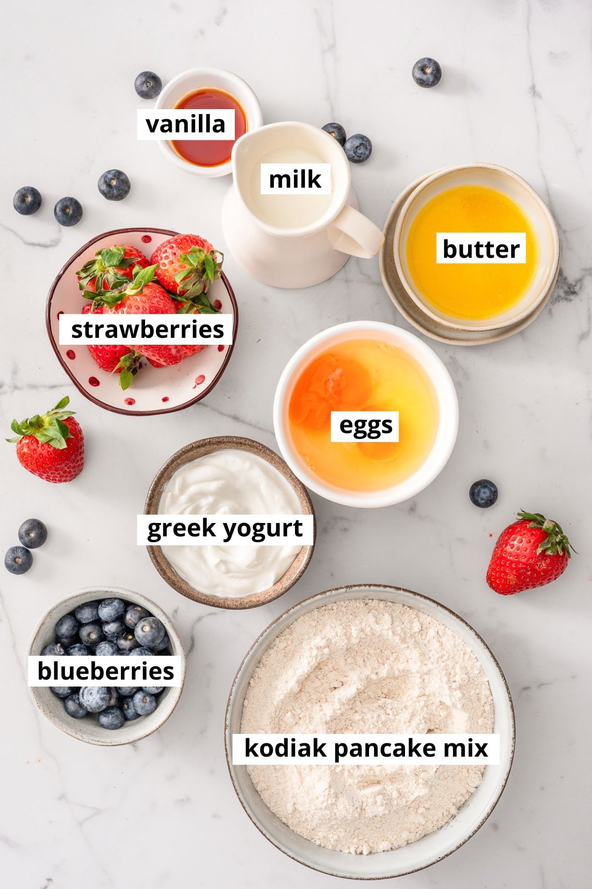 Kodiak pancake mix, eggs, milk, butter, vanilla, Greek yogurt, strawberries, blueberries.