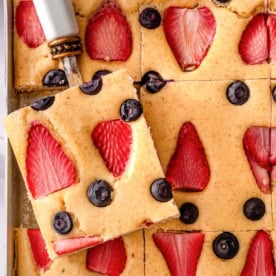 Kodiak sheet pan pancakes with blueberries and strawberries.