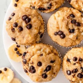 Cottage cheese banana muffins with chocolate chips on a platter.