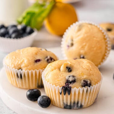 Greek yogurt blueberry muffins on a plate.