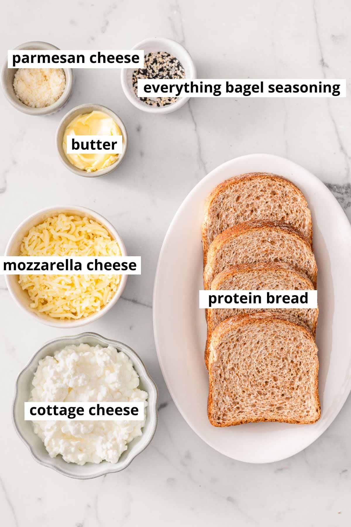 Protein bread, cottage cheese, mozzarella cheese, parmesan cheese, butter, everything bagel seasoning.