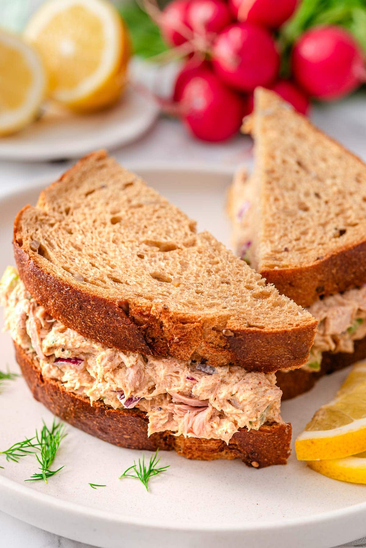 Greek yogurt tuna salad served in a sandwich.